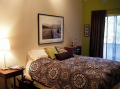 Upstairs bedroom with Queen bed, couch, extra pull out mattress for kids. Great view!